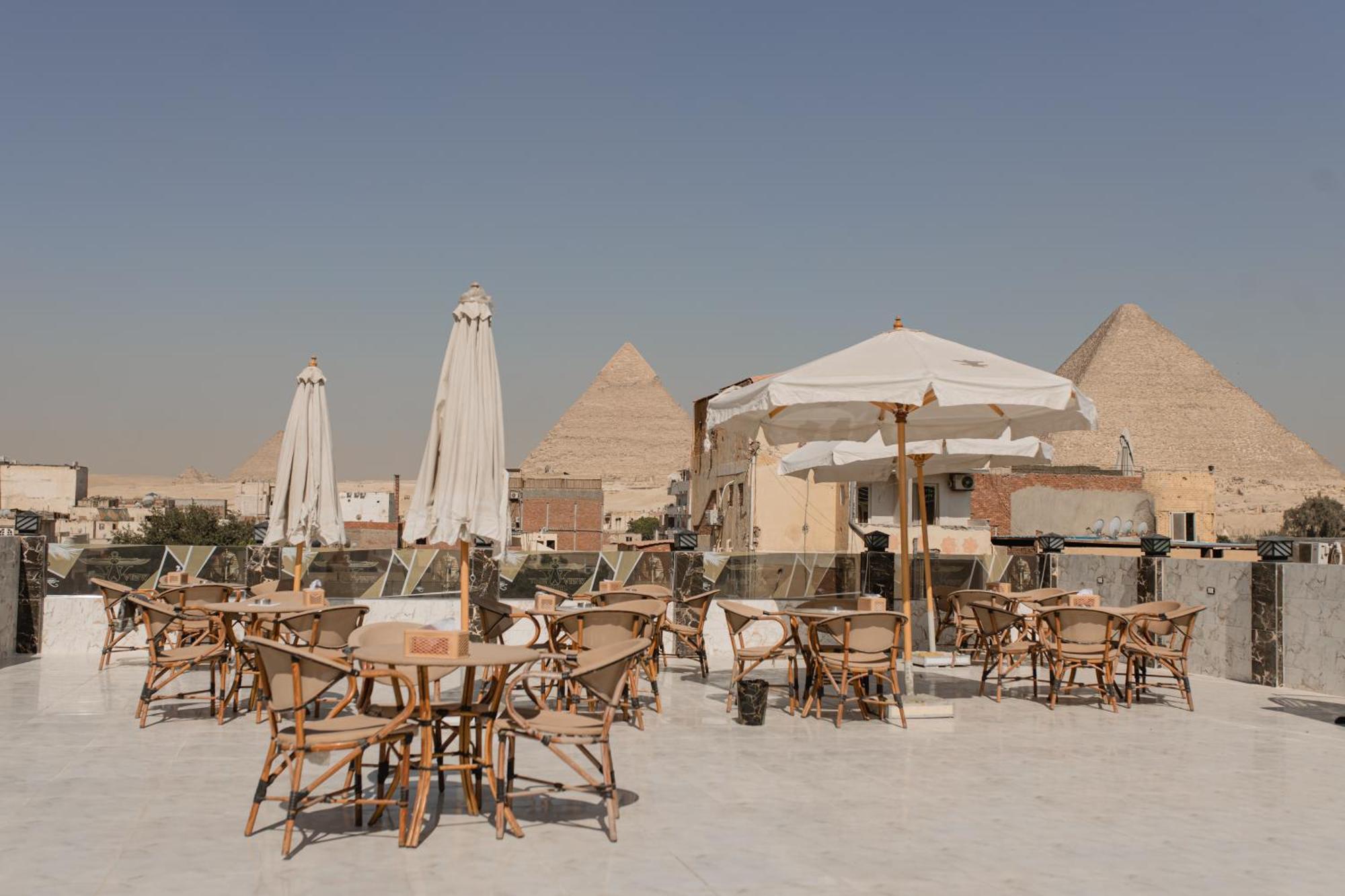 The View Pyramids Hotel Kafret el-Gabal Eksteriør billede