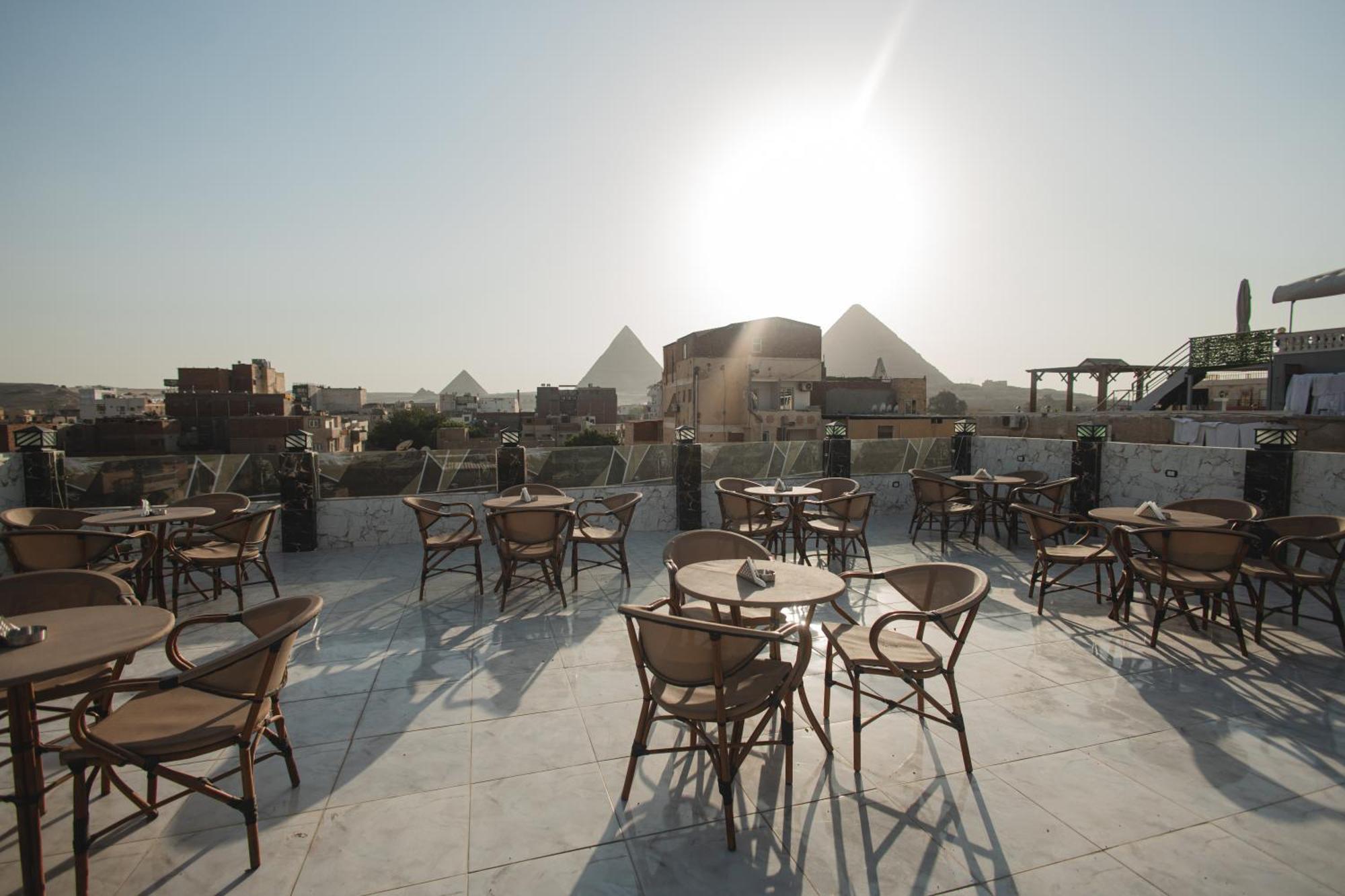 The View Pyramids Hotel Kafret el-Gabal Eksteriør billede